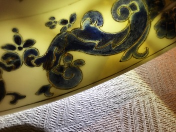 A pair of Chinese Pronk studio eggshell plates with parrots on a perch, Yongzheng/Qianlong