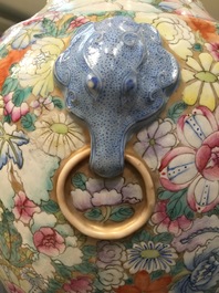 A Chinese famille rose millefleurs hu vase, Qianlong mark, 19/20th C.
