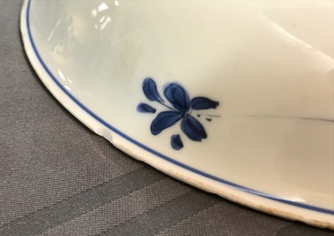 A Chinese blue and white dish with sanduo fruits among foliage, Kangxi