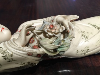 A Chinese polychrome ivory figure on wooden stand, 2nd quarter 20th C.