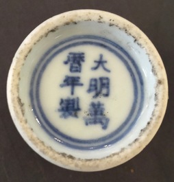Four Chinese blue and white and famille verte miniature vases, Kangxi and later