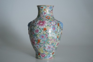 A Chinese famille rose millefleurs hu vase, Qianlong mark, 19/20th C.