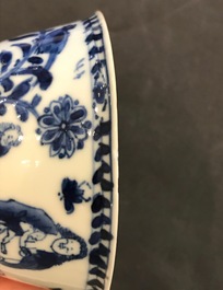 Une tasse et soucoupe en porcelaine de Chine bleu et blanc figurant La Vi&egrave;rge &agrave; l'Enfant, Kangxi