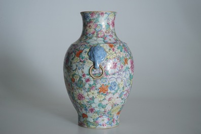 A Chinese famille rose millefleurs hu vase, Qianlong mark, 19/20th C.