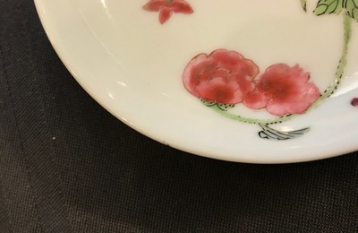 Two Chinese famille rose cups and three saucers with floral design, Yongzheng/Qianlong