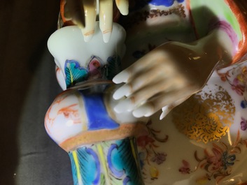 Two large Chinese famille rose candle holders modelled as court ladies, Qianlong