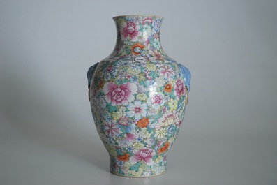 A Chinese famille rose millefleurs hu vase, Qianlong mark, 19/20th C.