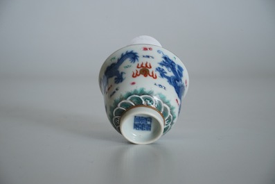 A Chinese famille rose cup and stand with dragon design, Qianlong mark, 19/20th C.