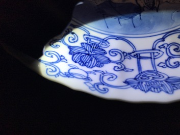 A pair of Chinese blue and white plates with fine landscapes, Kangxi