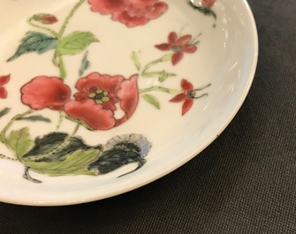Two Chinese famille rose cups and three saucers with floral design, Yongzheng/Qianlong