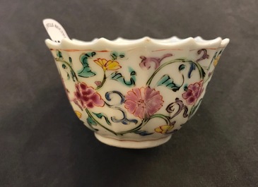 A pair of Chinese lobed famille rose cups and saucers with Magu, Yongzheng