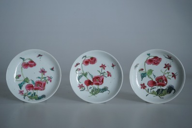 Two Chinese famille rose cups and three saucers with floral design, Yongzheng/Qianlong