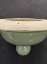 A Chinese monochrome celadon baluster vase and cover, 19th C.