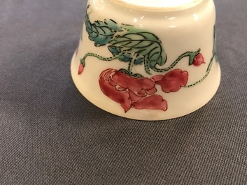 Two Chinese famille rose cups and three saucers with floral design, Yongzheng/Qianlong