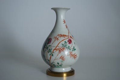 A Chinese famille rose bronze-mounted yuhuchunping vase, Qianlong mark, 19/20th C.
