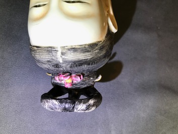 Two large Chinese famille rose candle holders modelled as court ladies, Qianlong