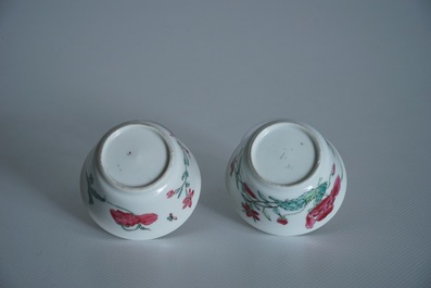 Two Chinese famille rose cups and three saucers with floral design, Yongzheng/Qianlong