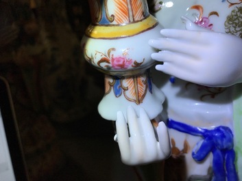 Two large Chinese famille rose candle holders modelled as court ladies, Qianlong