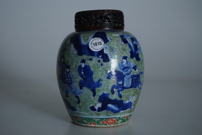 A Chinese famille verte jar with wooden cover and stand, Kangxi