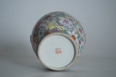 A Chinese famille rose millefleurs hu vase, Qianlong mark, 19/20th C.