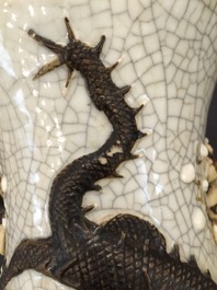 A Chinese famille rose "100 boys" vase and a Nanking dragon vase, 19th C.