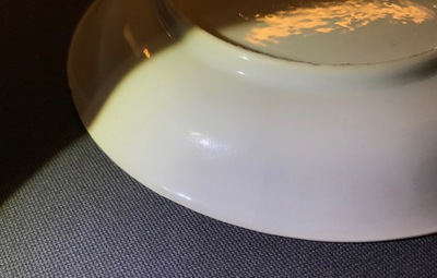 A Chinese grisaille cup and saucer with Europeans, Yongzheng