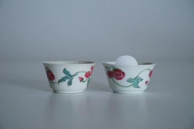 Two Chinese famille rose cups and three saucers with floral design, Yongzheng/Qianlong