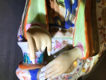 Two large Chinese famille rose candle holders modelled as court ladies, Qianlong