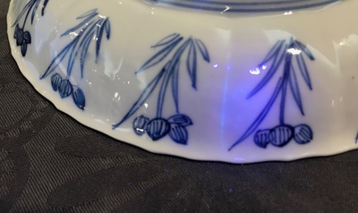 A pair of Chinese blue and white plates with fine landscapes, Kangxi