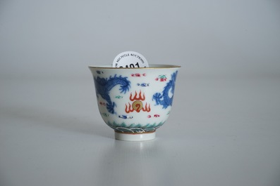 A Chinese famille rose cup and stand with dragon design, Qianlong mark, 19/20th C.
