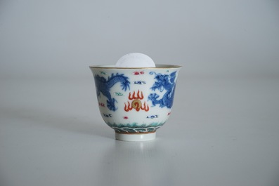 A Chinese famille rose cup and stand with dragon design, Qianlong mark, 19/20th C.