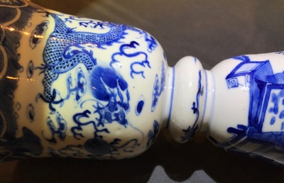 Two pairs of Chinese blue and white candlesticks with dragons, 19/20th C.
