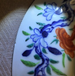 Une paire d'assiettes en porcelaine de Chine doucai &agrave; d&eacute;cor de grenades, marque et &eacute;poque de Qianlong