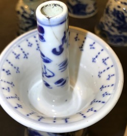Two pairs of Chinese blue and white candlesticks with dragons, 19/20th C.