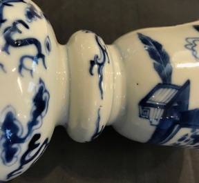 Two pairs of Chinese blue and white candlesticks with dragons, 19/20th C.