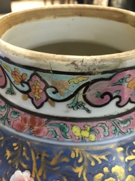 A Chinese bronze-mounted famille rose on blue-ground baluster vase and cover, Yongzheng
