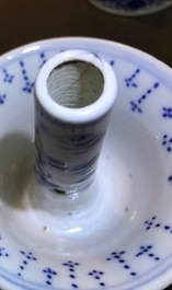Two pairs of Chinese blue and white candlesticks with dragons, 19/20th C.