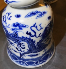 Two pairs of Chinese blue and white candlesticks with dragons, 19/20th C.