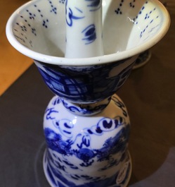 Two pairs of Chinese blue and white candlesticks with dragons, 19/20th C.