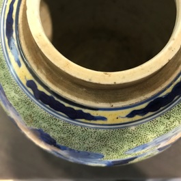 A Chinese famille verte jar with wooden cover and stand, Kangxi