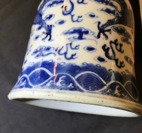 Two pairs of Chinese blue and white candlesticks with dragons, 19/20th C.