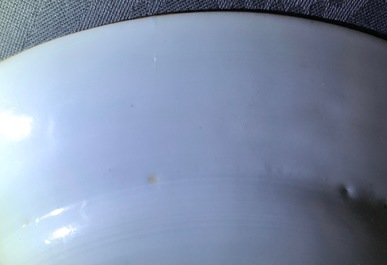 A pair of Chinese famille rose plates with a Dutch nobleman, Qianlong