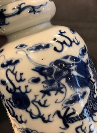Two pairs of Chinese blue and white candlesticks with dragons, 19/20th C.