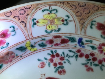 A pair of Chinese famille rose plates with a Dutch nobleman, Qianlong
