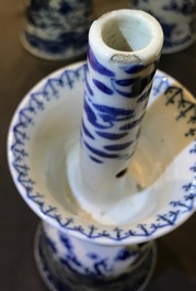 Two pairs of Chinese blue and white candlesticks with dragons, 19/20th C.