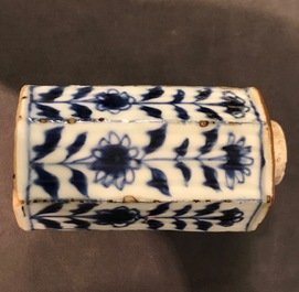 A Chinese Dehua blanc de Chine temple lion, a vase and a blue and white tea caddy, Kangxi and later