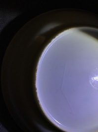 Two Chinese armorial cups and a saucer for the Belgian market, Qianlong