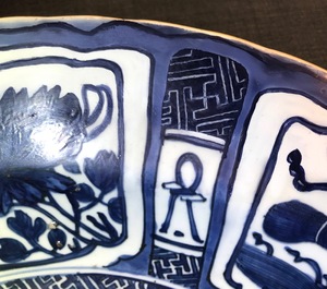 A very large Chinese blue and white kraak porcelain charger with a dragon, Wanli