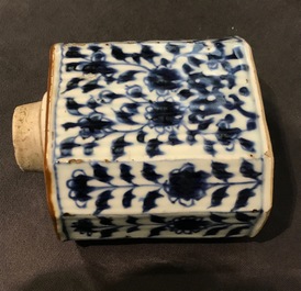 A Chinese Dehua blanc de Chine temple lion, a vase and a blue and white tea caddy, Kangxi and later