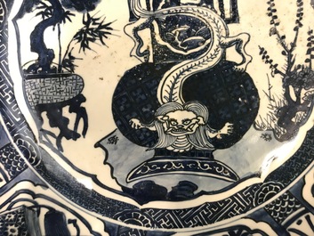 A very large Chinese blue and white kraak porcelain charger with a dragon, Wanli
